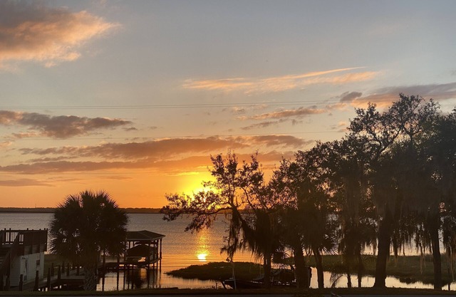 Watch Florida sunsets from the covered lakefront dock