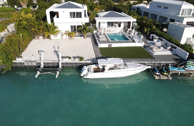 Waterfront Luxury Villa with Optional Boat and Beach Access Just Steps Away