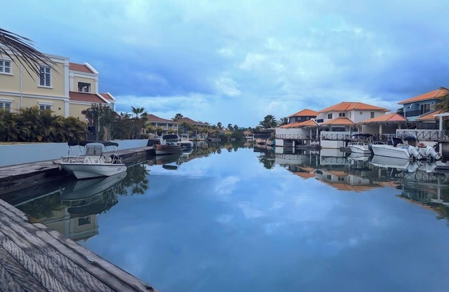 Waterfront 2-BR Oasis with dock – Near Beaches, Stunning Views & Relaxing Vibes!