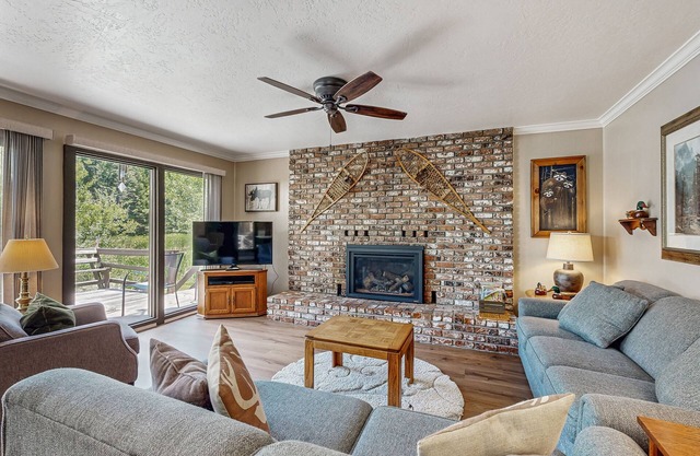 Waterfront getaway with fireplace & furnished deck - close to lake
