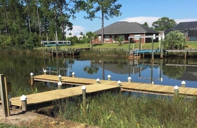 Waterfront Home With Boat Dock, Kayaks, Fishing Poles and More!