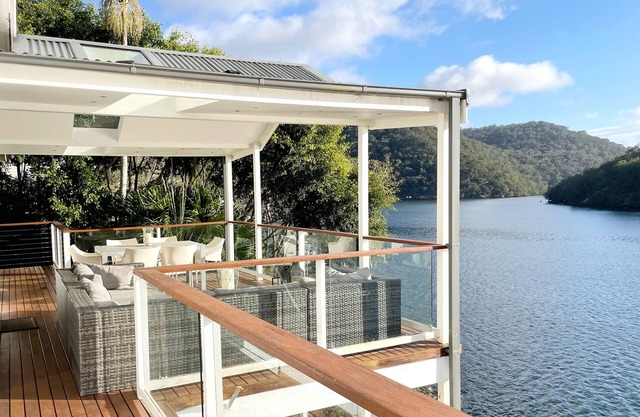 Waterfront modern property w/boat, outside hot tub, SUPs, kayaks, fishing equip