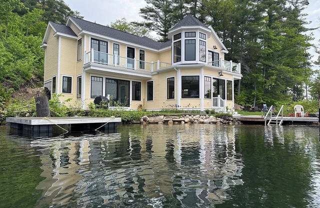 Waterfront New Construction 4 bedroom home w private U shaped dock Private beach