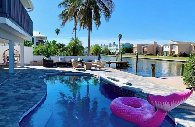 Waterfront Oasis, Heated Pool, Dock, Golf Cart & Chef’s Kitchen