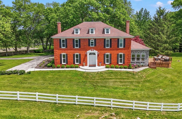 Welcome to Stillmeadow Farm, a grand Georgian-style home nestled on 135 acres in Frankfort, KY