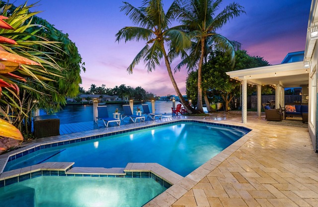 Welcome to Three Palms, A Charming Waterway Villa with Terrific Location!