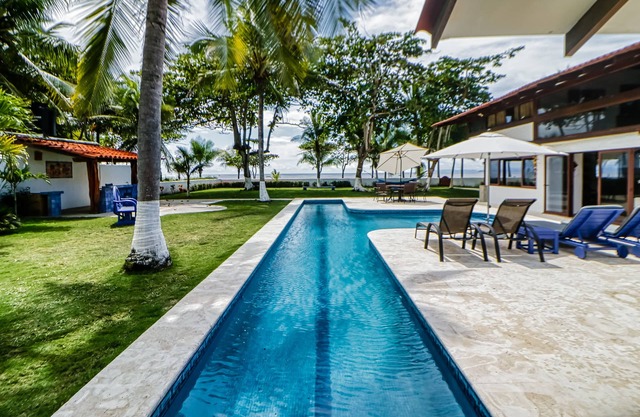 Wonderful beachfront property with pool, patio, & beach gear - snowbirds welcome