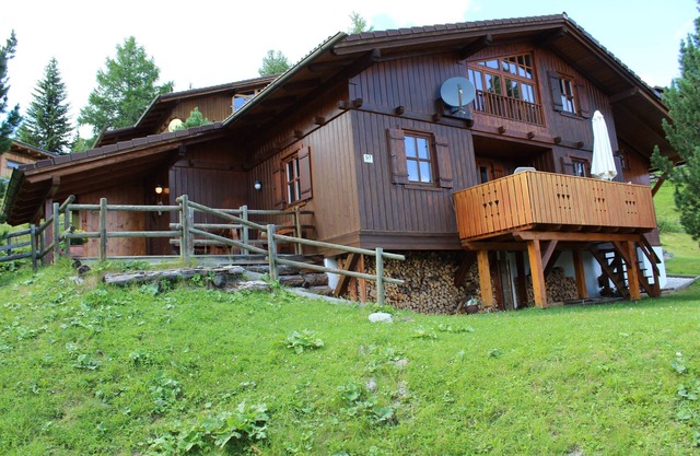 Wooden house 1800m above sea level with a sauna and a tiled stove