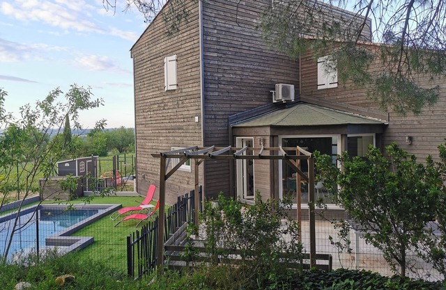 Wooden house with swimming pool