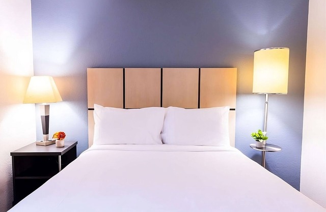 Your Home Away From Home! TWO Modern Suites, Full Kitchens, Pets are Welcome!