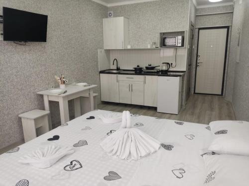 Kaztsik Apartment | светлая студия 2-65 в ЖК Теремки-2