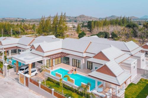 Pak Nam Pran Villa | บ้านพักทองสุขพูลวิลล่า ปราณบุรี Thongsuk Pool Villa Pranburi