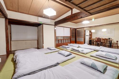 Suruga Ward Apartment | 貸切古民家 海まで徒歩3分 富士山の見える海岸 最大14名宿泊 家族親戚 帰省 合宿 BBQ Japanese ミクソロジーハウスふじや Mixology House Fujiya