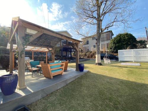 Yawatano Villa | 貸別荘Casa de Campo 2SLDK别墅 駐車場 芝生東屋付き BBQ 大室山と海遠望伊豆高原5分