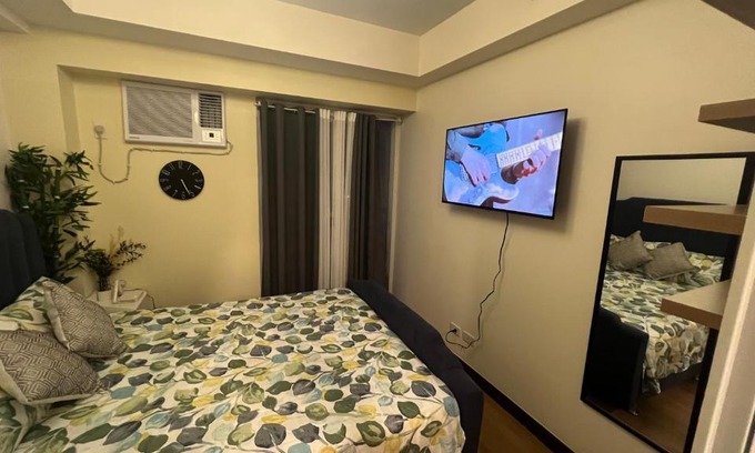 A. Bonifacio Apartment | 1-BR Condo Unit at The Celandine with Refreshing Balcony-view of the Pool