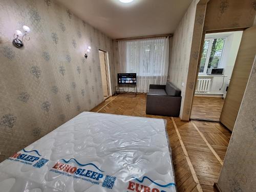 Sukhinovka Apartment | 2 кімнатна Квартира подобово у центрі Полтави біля ЦУМу з власною закритою парковкою Документи для відрядження Мережа квартир