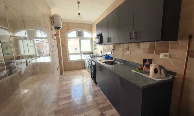 Al Duqqi Apartment | 2-bedroom apartment in terrific New Cairo with WiFi