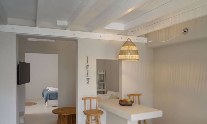 Megalochori House | 2 bedroom Family Cave Suite, terrace & kitchen, by Elements Suites