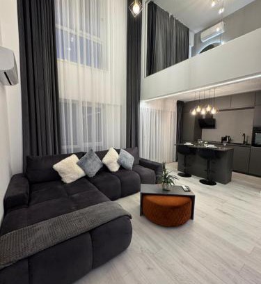 Sector 2 Apartment | 2 Level 1 Bedroom Lux Apartment with Balcony 75 Inch TV and Sofa Bed near Promenada Mall with High Ceilings Kitchen Washer and Work Space