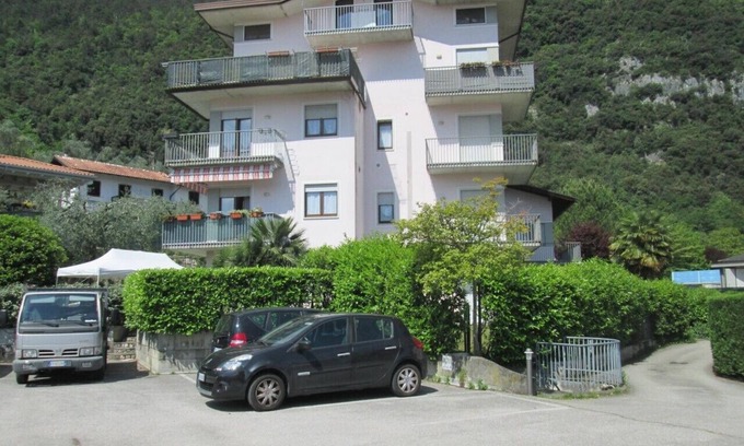 Riva del Garda Apartment | 2 min from the historic center. Small apartment in quiet area with balcony.