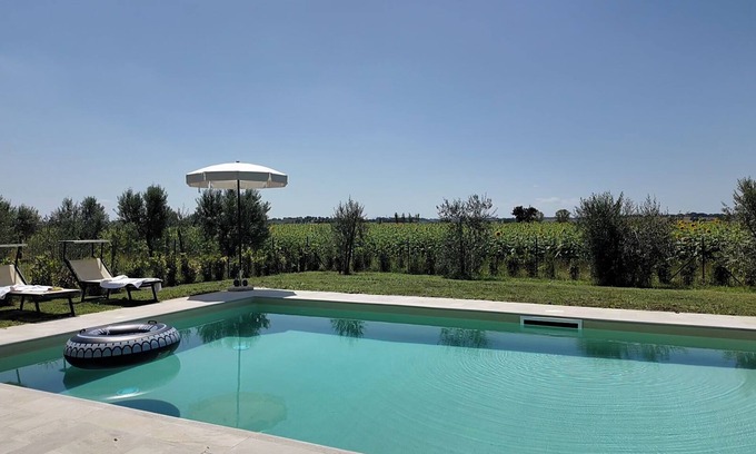 Cortona Villa | 3BR apartment with nice private garden and large shared pool