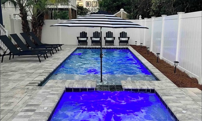 Riviera Beach House | 4-bedroom house, Heated Pool, Hot Tub, 6 person Golf Cart. 2 blocks from beach.