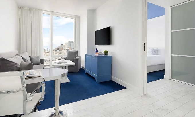 SoHo Hotel | 4 Elegant Deluxe Suites with Living Room! Offering sweeping views of NYC!