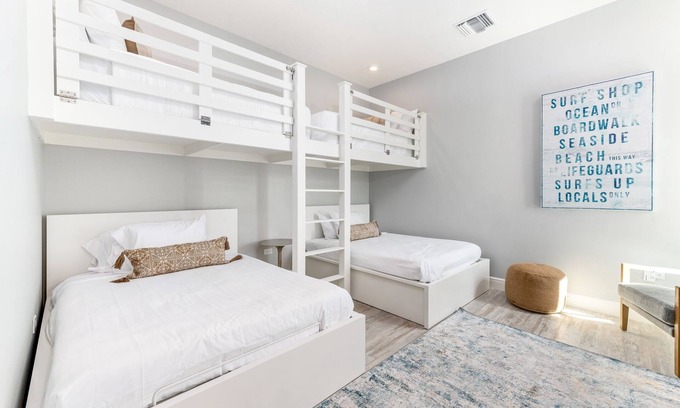 West Bay Condo | 7 Mile Luxury Beach Club. Ocean views from Roof Terrace and Pool Pavilion.