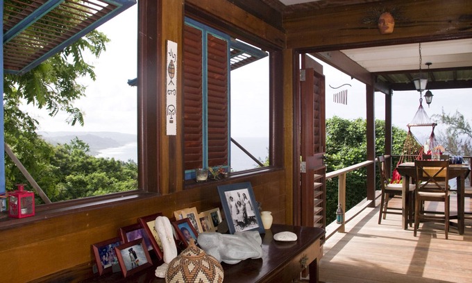 Ragged Point House | A beautiful wooden house built among the trees with views of the Atlantic coast