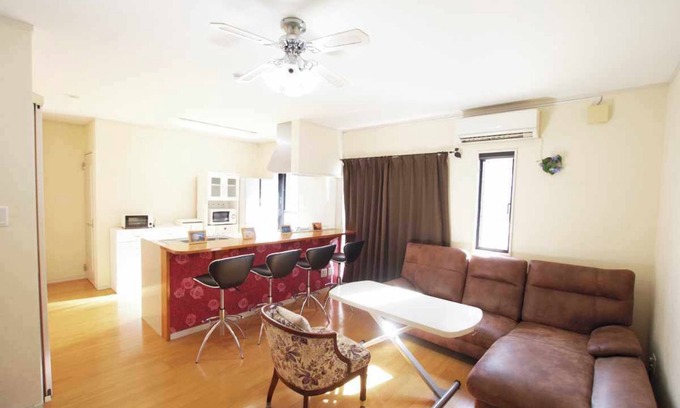 Amami House | A guesthouse limited to one couple. Conveniently located in the center of Amami Oshima for sightseeing. 30 seconds to the largest downtown area, Yajin River. Fully equipped kitchen and laundry facilities are available for long-term stays.