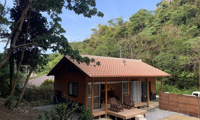 Genka House | A house in the forest, with a large garden for barbecue and a nearby river to play as much as you like.