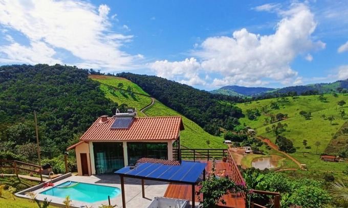 Moeda House | A Lapinha do Sertão é uma casa de hospedagem temporária, com vista panorâmica.