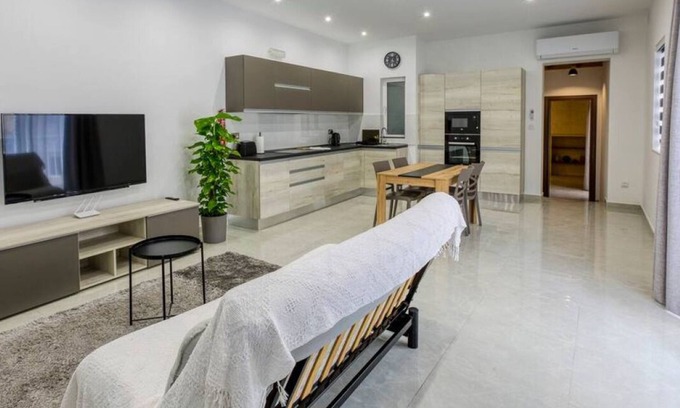 Il-Balluta Apartment | A lovely 1BR home with Balcony off the coast.