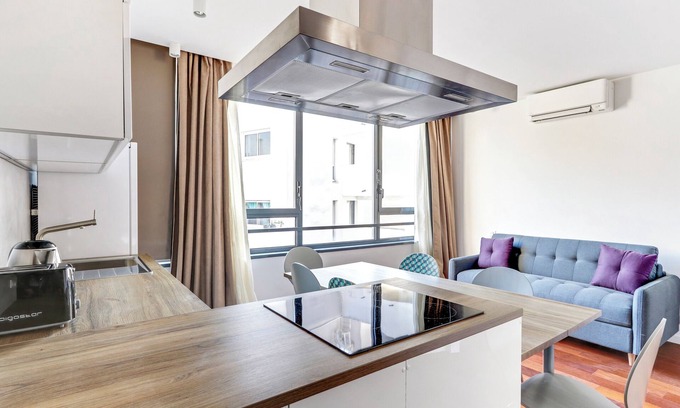Quartier de la Goutte-d'Or Apartment | A Modern 2/3 BDR with parking at La Chapelle