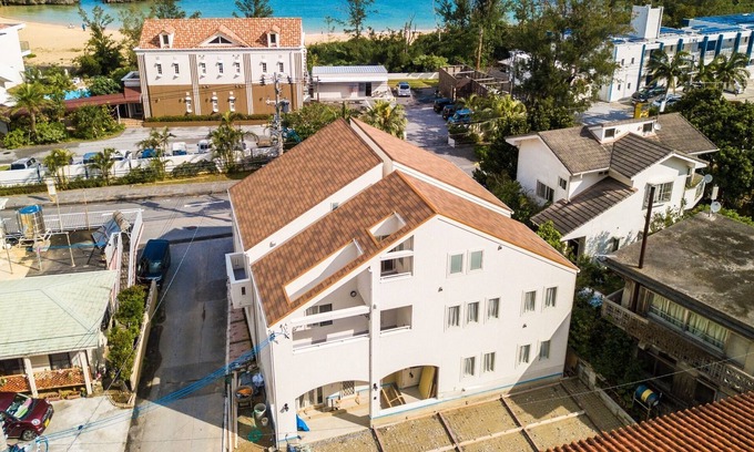 Maeda House | A modern house with a simple and calm atmosphere b / Kunigami-gun Okinawa