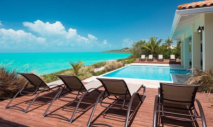 Venetian Road Settlement Villa | A Palm Tree Paradise at This Wonderful Oceanfront Villa