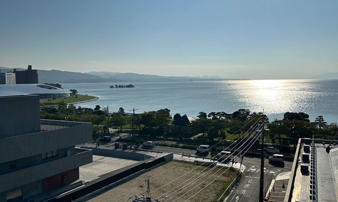 Yunokawa Onsen Apartment | A panoramic view of Lake ShinjiSpacious living s/Matsue Shimane