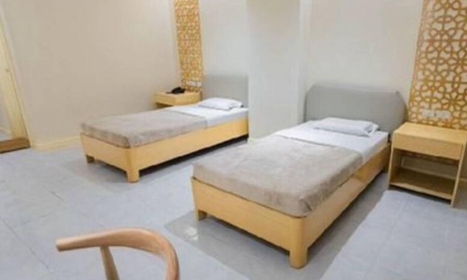 Downtown Tacloban Apartment | A Symphony of Style: Etsu Hotel's Studio in Harmony