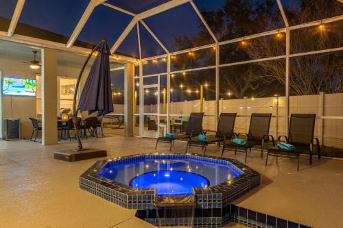 Sabal Harbour House | A Wave From it All! Pet friendly, Private heated pool home with fire pit!