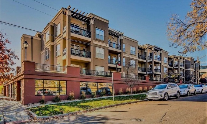 Jefferson Park Condo | All new furniture, heated garage, newer building location makes this a MUST!