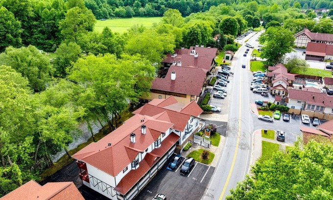 Helen House | Alpine River Suites #504 - Coca-Cola-Themed River Condo in Downtown Helen