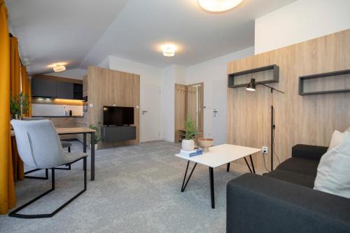 Banska Bystrica Apartment | ALURE RESIDENCES 11 - 24h self check-in & private parking next to the apartment building included, CITY CENTER right on SNP Square in a quiet passage, new building, best deal in town