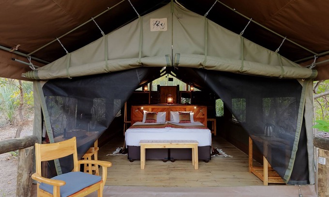 Maun Cabin | Amazing view on the river from your tent to the Okavango Delta