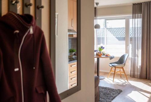 Spiekeroog Apartment | Antares Spiekerooger Gästehaus-Sonnengartenterrasse Süd - Wohnung 3