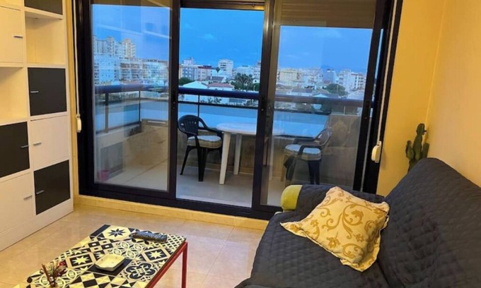 Plaza De La Costera Apartment | Apartment 'Atico Bellreguart' with Shared Pool, Wi-Fi and Air Conditioning