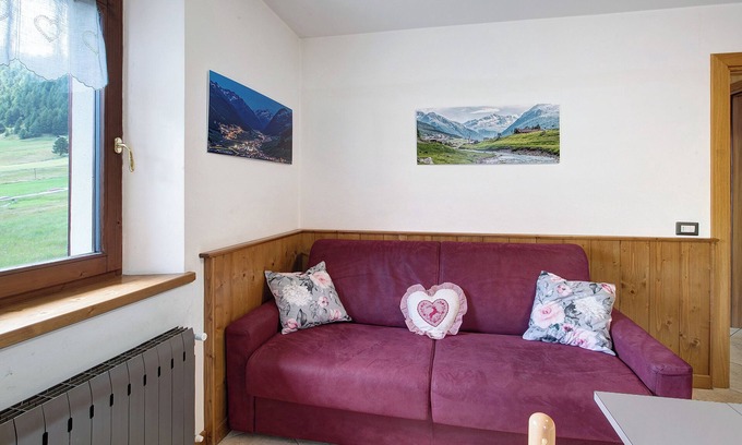 San Rocco Apartment | Apartment "Bormetti Paolo Sara" with Mountain View, Shared Garden & Wi-Fi