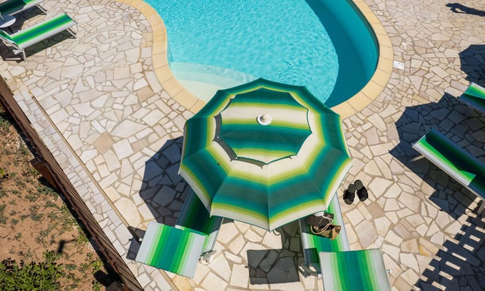 Aglientu Apartment | Apartment 'Casa Lentischio Piscina Evista Mare' with Sea View, Shared Pool and Wi-Fi