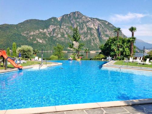 Bissone Apartment | Apartment Charming Gardenview App- 105 by Interhome