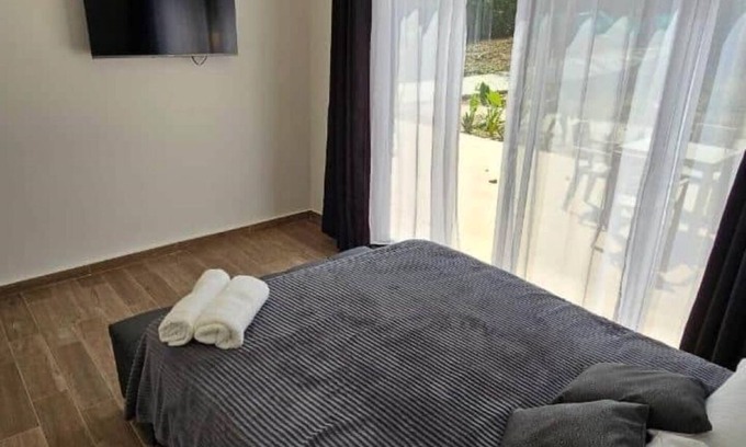 Tierra Bomba Island Apartment | Apartment 3 with balcony and view of the tropical garden