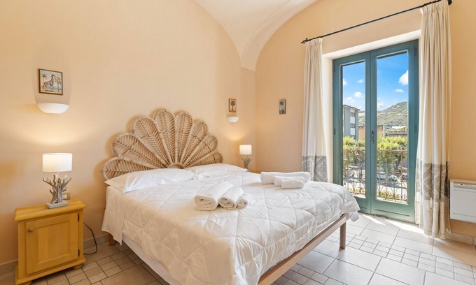 Bosa Historic Centre Apartment | Apartment 'Color Sabbia' with Balcony, Wi-Fi and Air Conditioning